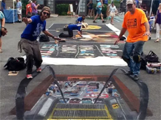 Escalator to lower level of the festival 3D chalk art