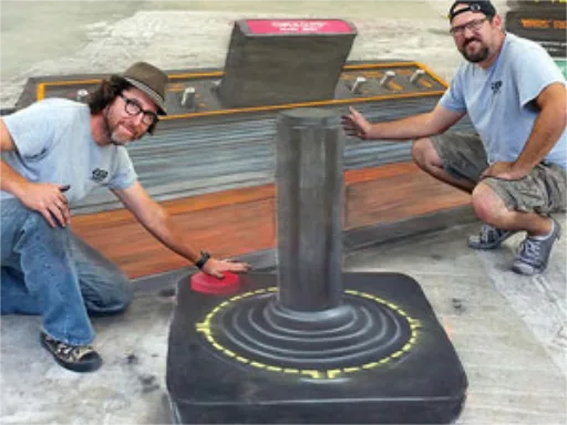 Posing with giant Atari 2600 3D chalk art