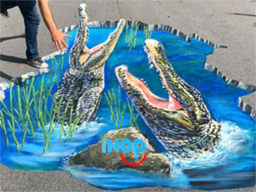 Posing with IHOP Gator Hole 3D chalk art