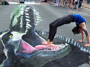 Posing with Tyrannosaurus Rex 3D pavement art