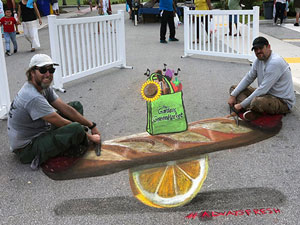 Bread and fruit teeter totter 3D pavement art