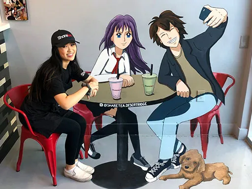Posing with Sharetea Desert Ridge bubble tea 3D chalk art wall-to-floor mural
