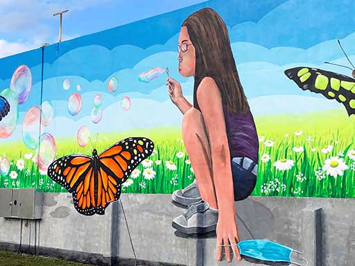 Public art mural Reclaiming the Distance at South Olive Park West Palm Beach