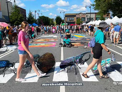 Posing with 3D chalk art Beetles Abbey Road
