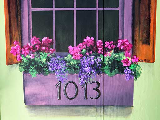 Detail of Faux window with flower box wall mural
