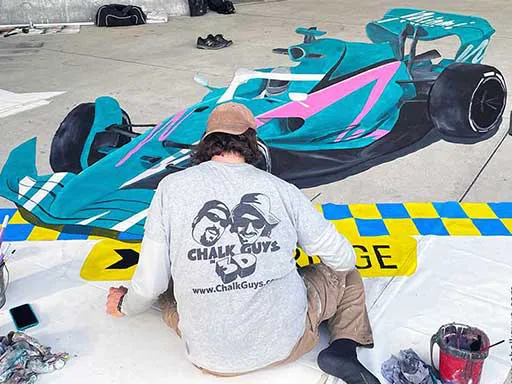 Working on 3D chalk art F1 Miami Grand Prix Car painted on canvas