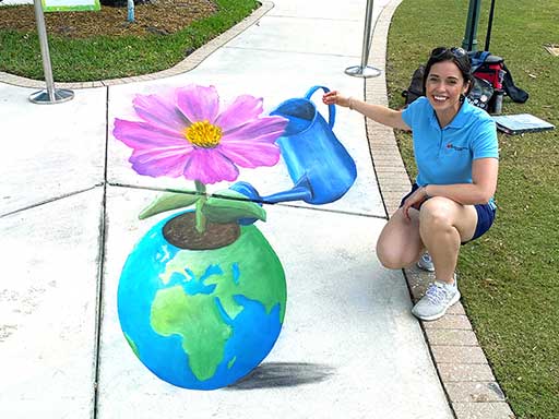 3D Earth Day plant with interactive watering can chalk art