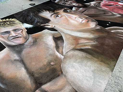 Posing with Chalk image of Sylvester Stallone as Rocky Balboa with Apollo Creed, Clubber Lang, and Ivan Drago