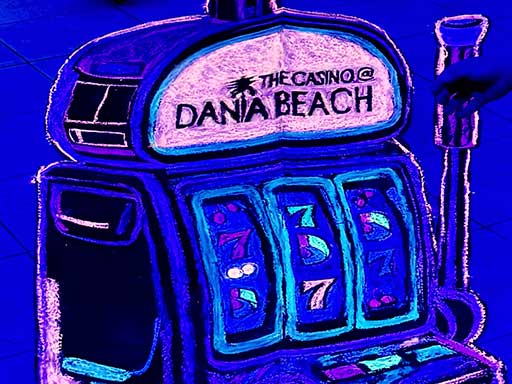 Flourescent 3D chalk art of a slot machine.