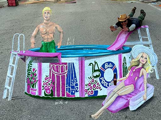 Posing with painted image of Ken and Barbie dolls in Pool Party set