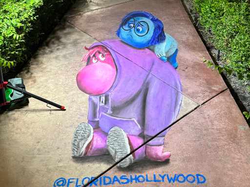 3D chalk art of Sadness and Embarrassment characters from Inside Out 2.