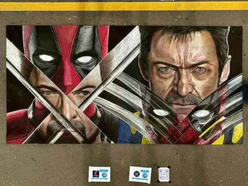 Chalk portrait art of Marvel's Deadpool and Wolverine.