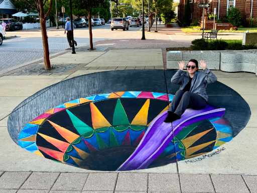 3D chalk art of an interactive kaleidoscope-themed slide.