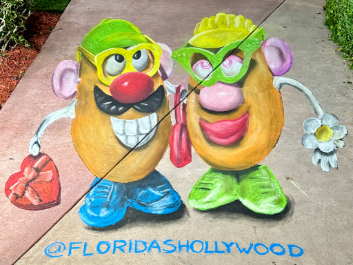 3D chalk art of Mr. and Mrs. Potatohead at Valentine's Day.
