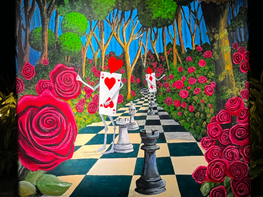 Wall mural based upon Alice and Wonderland painting the roses red.