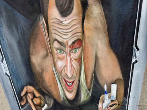 Top view of 3D painted art of Bruce Willis in HVAC vent from Die Hard movie.