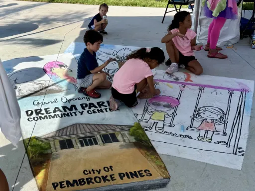 Kids coloring 3D chalk and painted art of coloring book for park grand opening.