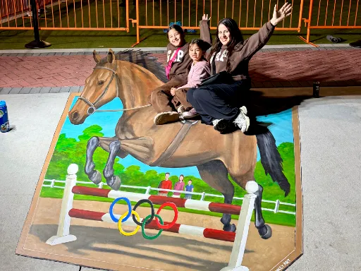 Posing with 3D painted art of jumping horse for Wellington's 30th Anniversary Celebration.