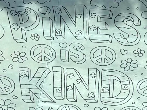 Large-scale 2D coloring book doodle chalk art for kindness themed event.