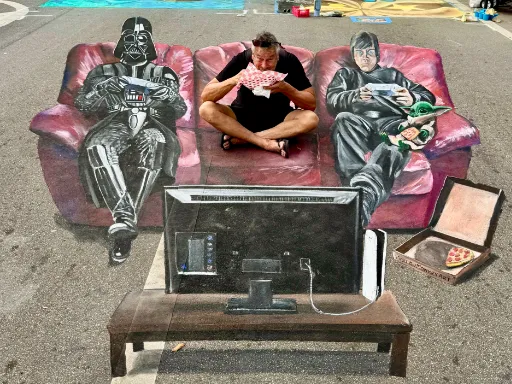 Interactive 3D painted art of Luke Skywalker and Darth Vader playing video games together on a red couch with Grogu.