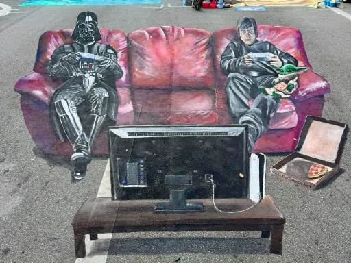 Interactive 3D painted art of Luke Skywalker and Darth Vader playing video games together on a red couch with Grogu.