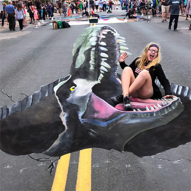 Posing with Tyrannosaurus Rex 3D chalk art.
