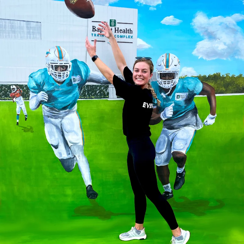 Posing with Miami Dolphins Training Camp 3D chalk art.