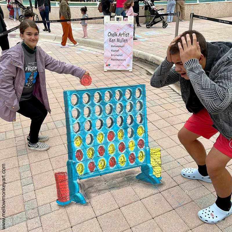 3D chalk art of Connect 4 game.