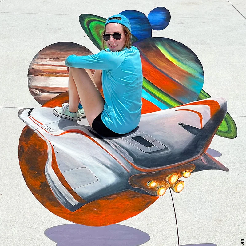 3D chalk art Spaceship flying through Milky Way Planets for Kennedy Space Center Visitor Complex Gateway The Deep Space Launch Complex grand opening.